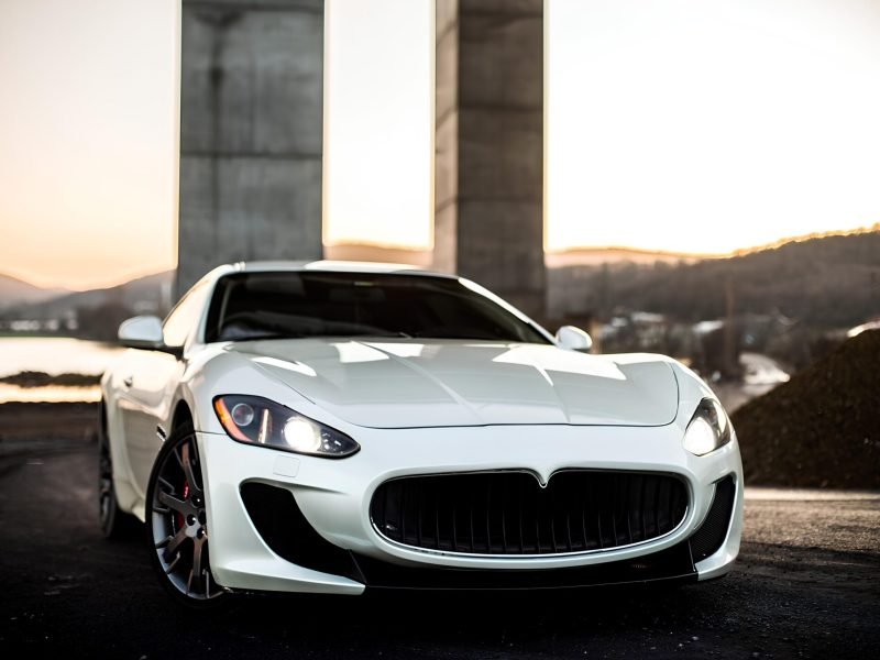white-coupe-sport-car-standing-road-front-view_114579-4005 (1)